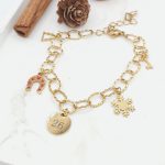 Βραχιόλι γούρι ατσάλι με κρεμαστά charm